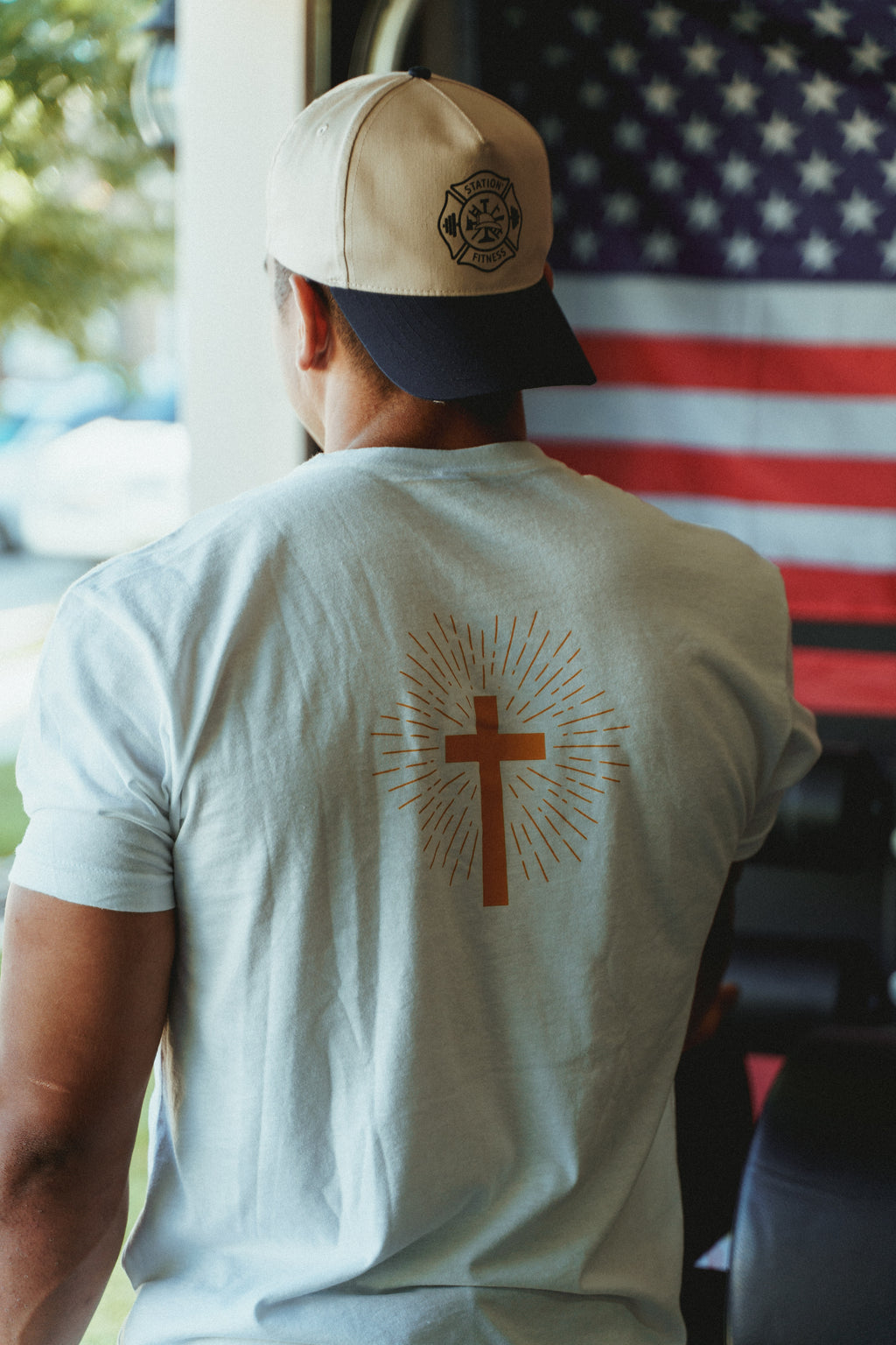 In God We Trust Shirt - back view with cross design